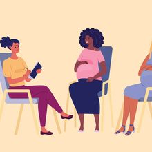 Four pregnant women sitting in chairs