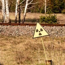 Ionizing Radiation sign near Chernobyl nuclear power plant zone of alienation, Ukraine